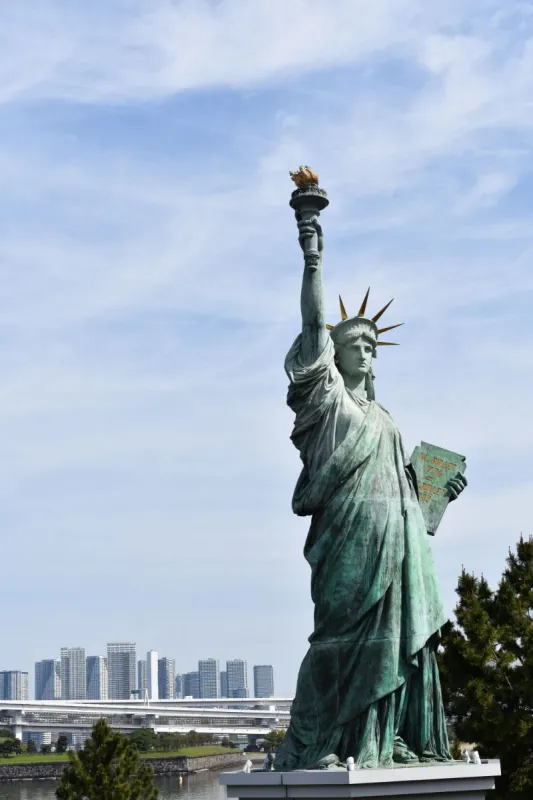 The Statue of Liberty against a city skyline