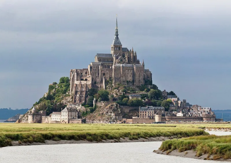 Mont-Saint-Michel abbey rising above the tidal marshes of the bay.